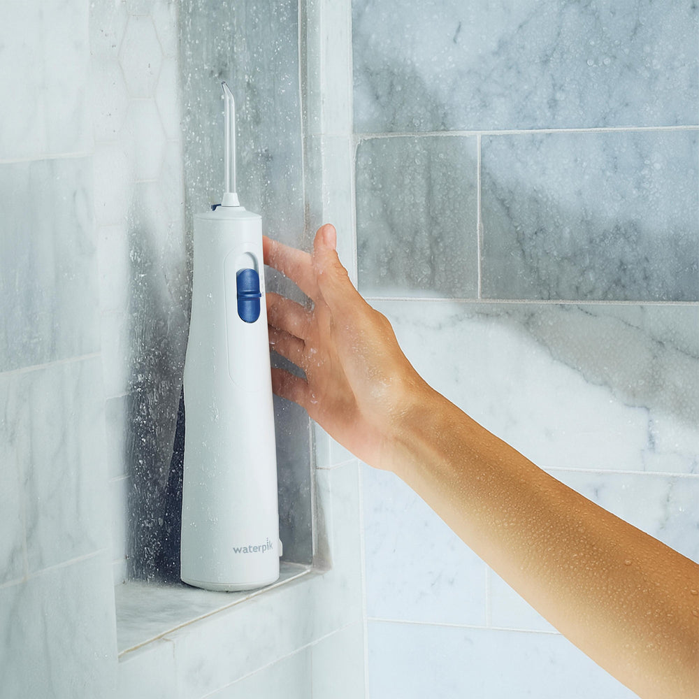 Waterpik® Cordless 100 Water Flosser — Rechargeable Oral Irrigator for Teeth & Gums